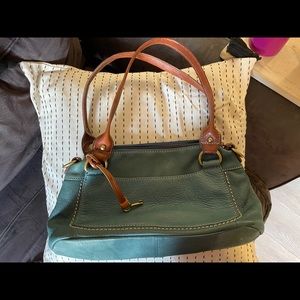 Dark green fossil purse — leather